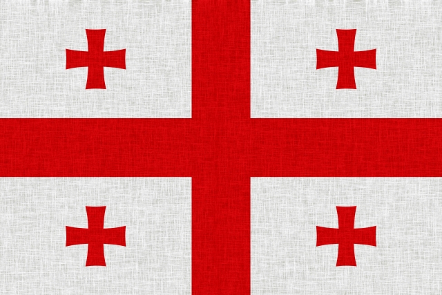 ジョージアの国旗。大きな十字の四隅にエルサレム十字を配したファイブ・クロス・フラッグ