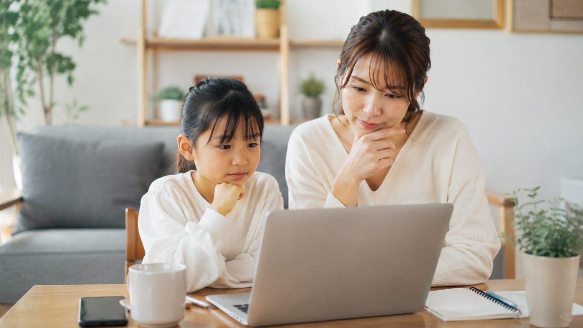 親子で考えているイメージ